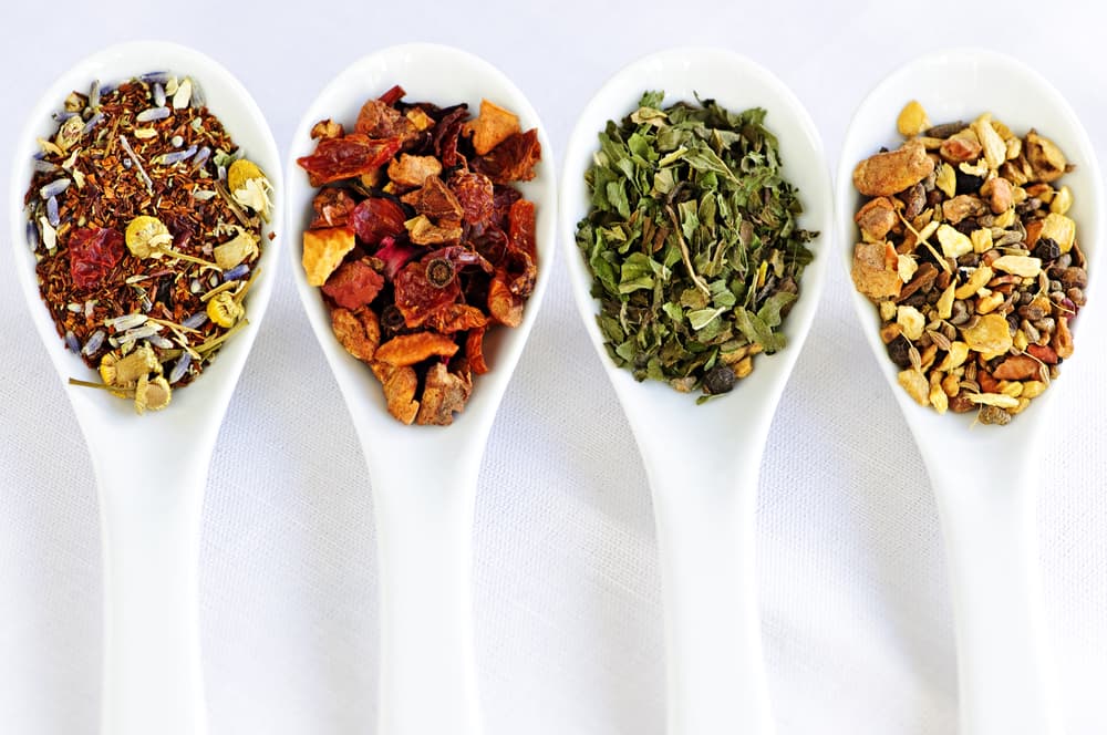 Herbal wellness dried tea in four spoons