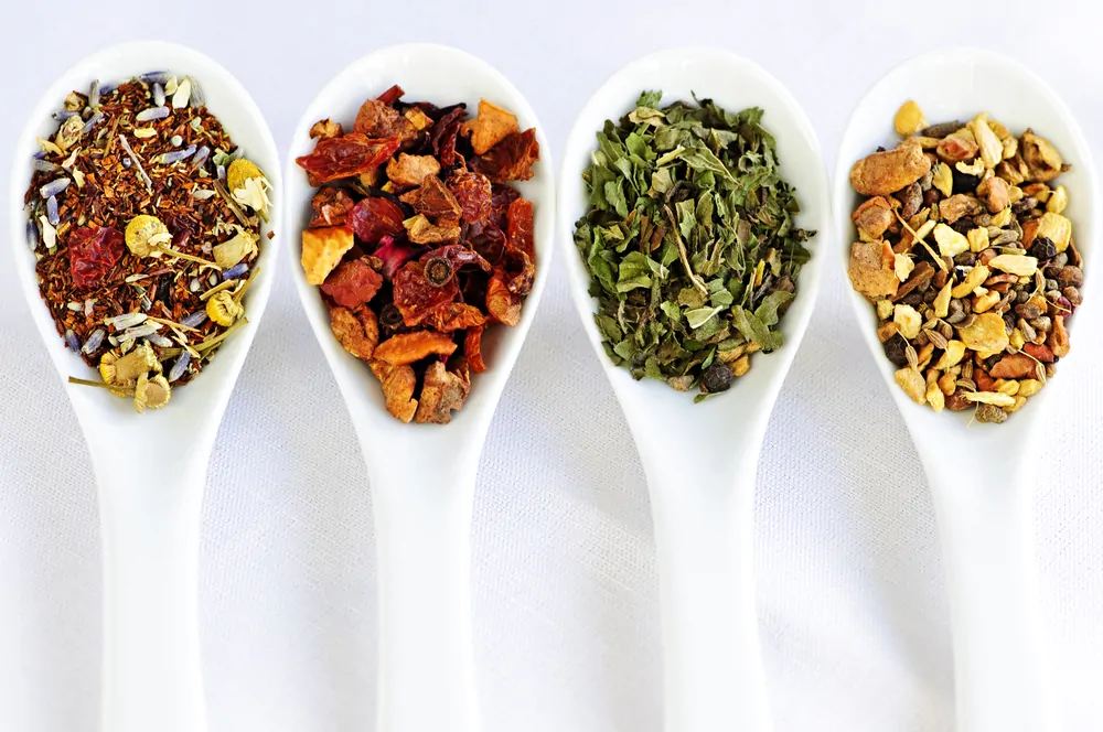 Herbal wellness dried tea in four spoons