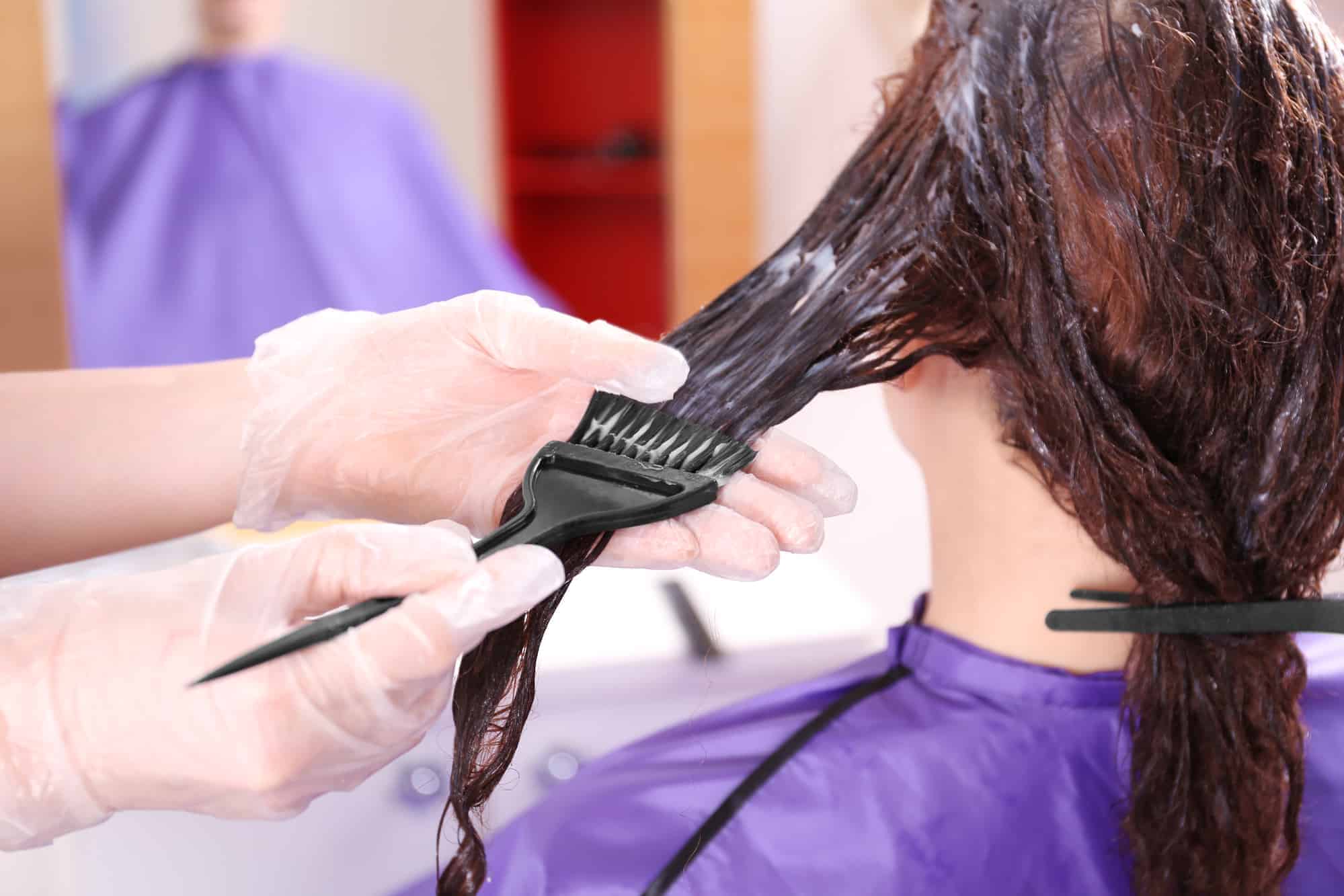 Process of dyeing hair at beauty salon