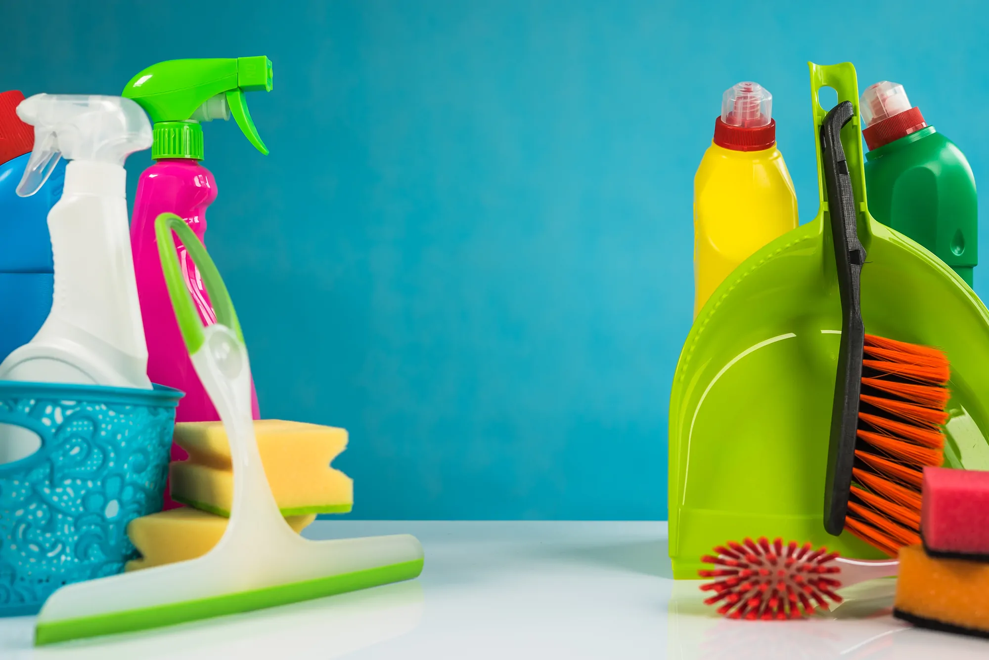 cleaning products against a blue background