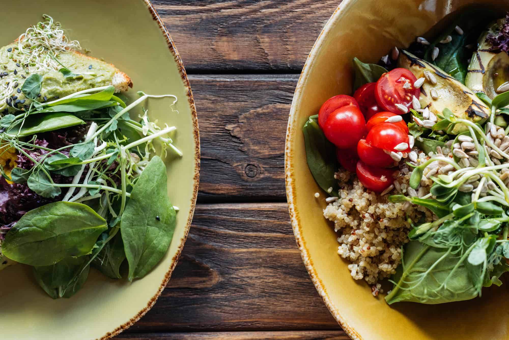 two salads side by side