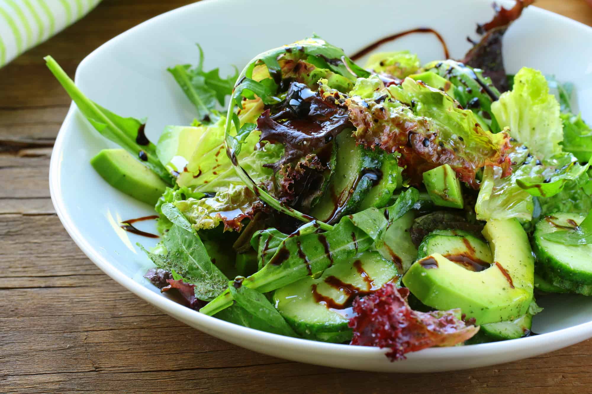 organic salad with avocado and balsamic dressing 