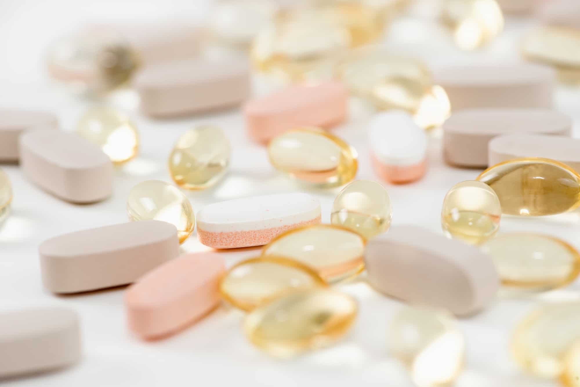 vitamins and minerals on a white table