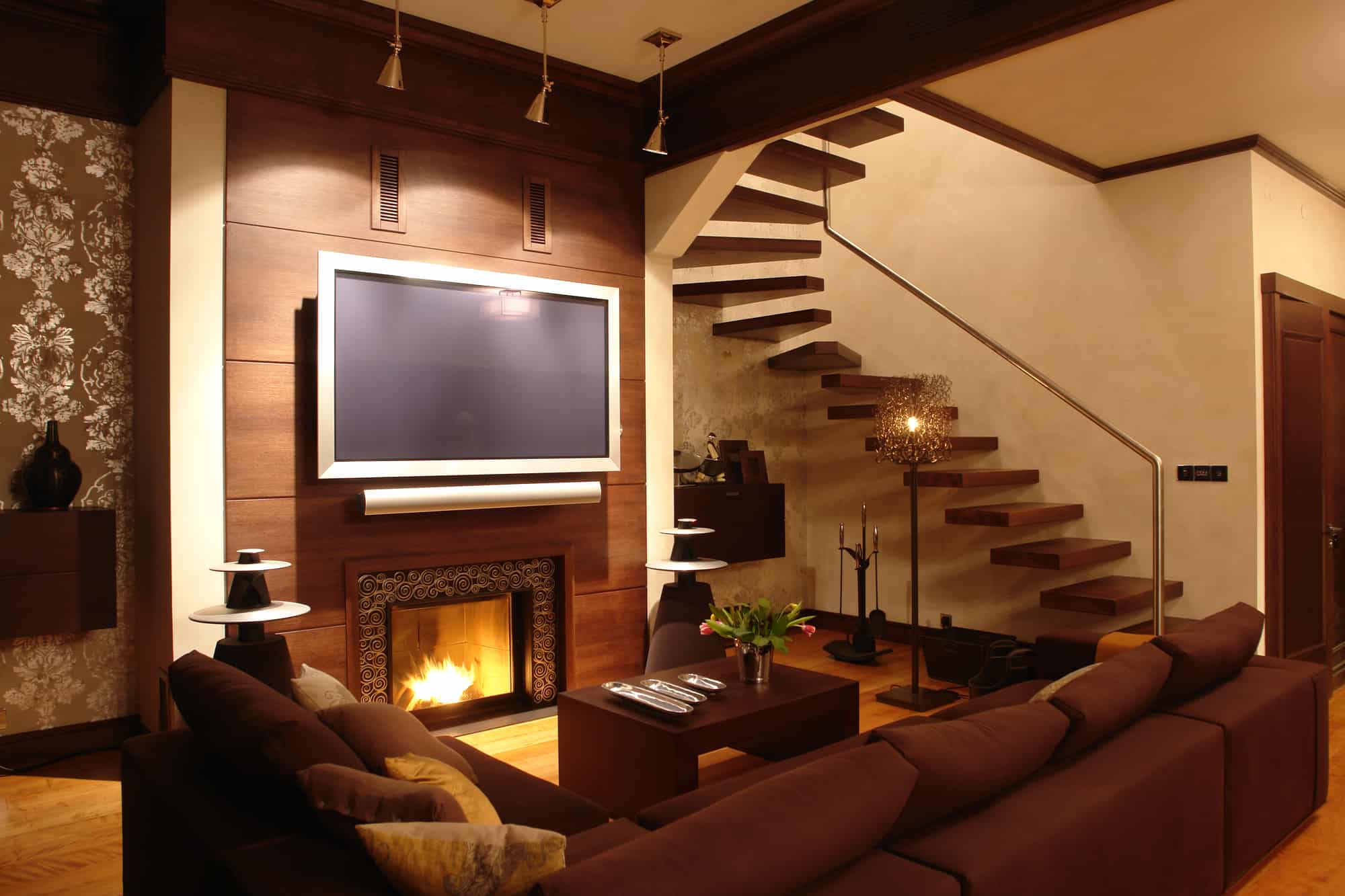 Downstairs living room with view of television that has fire retardants inside