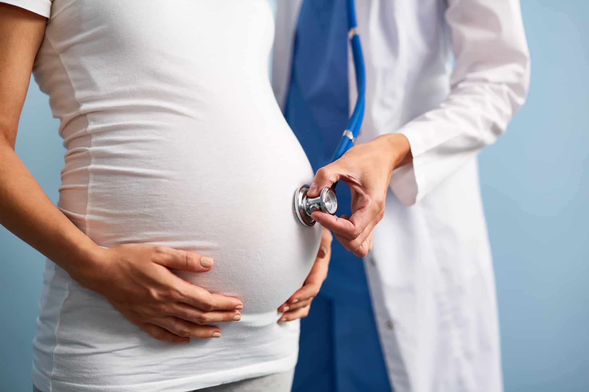 Abdomen of pregnant female during medical treatment