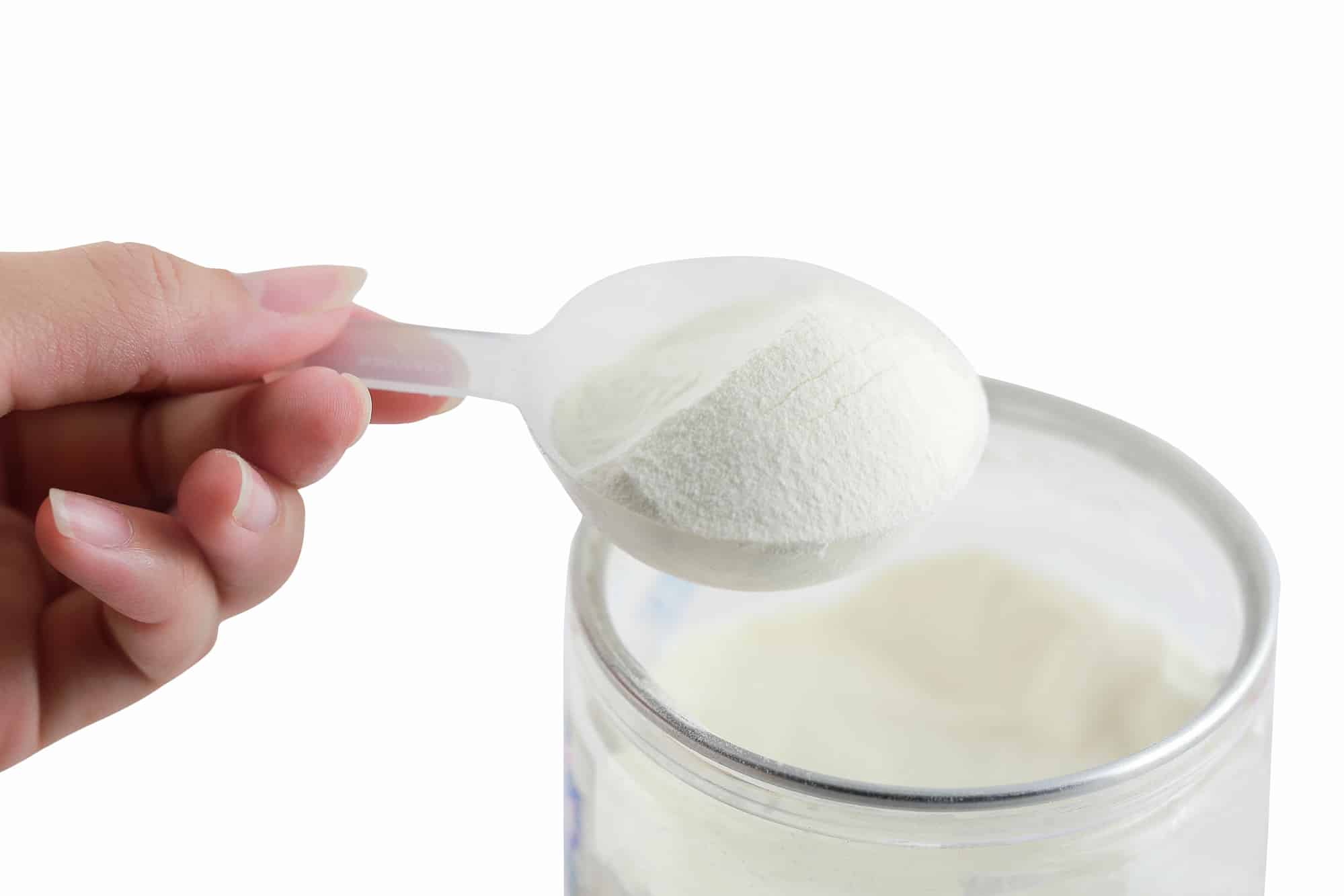 Collagen protein powder with spoon measure isolate on white background.