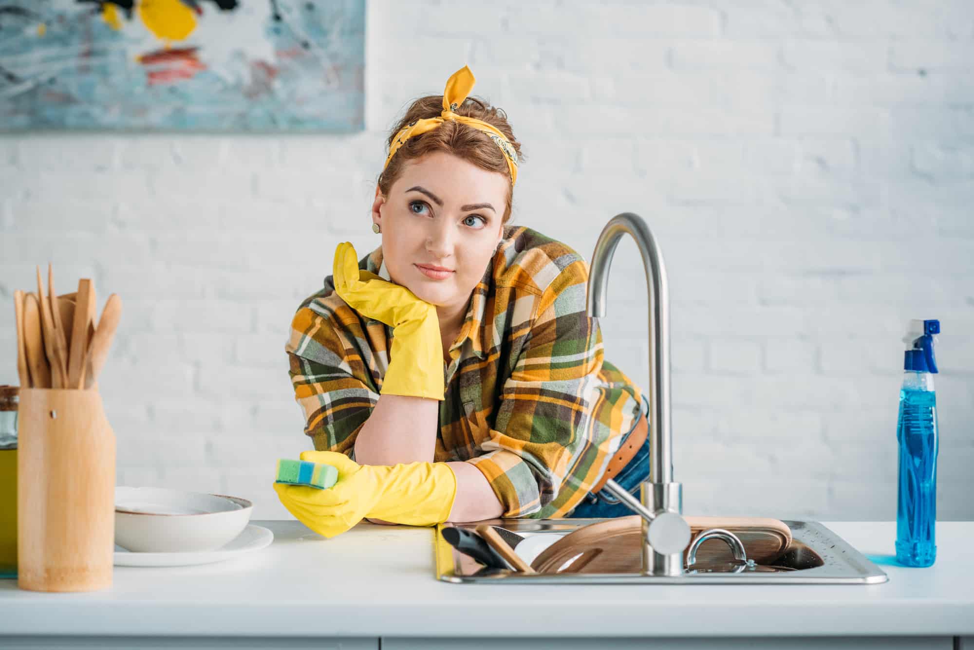 Woman with yellow latex gloves 