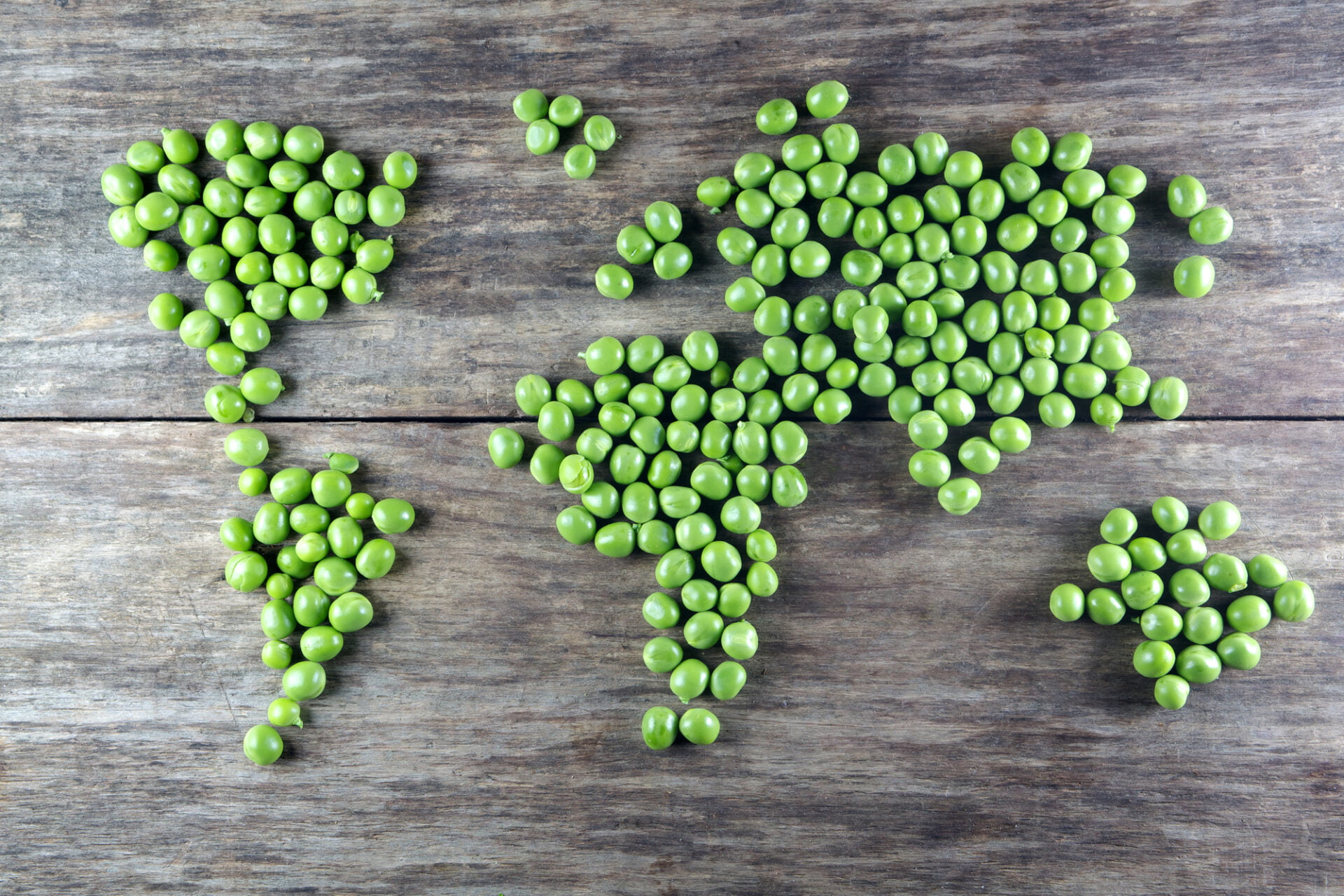 world map made form green peas