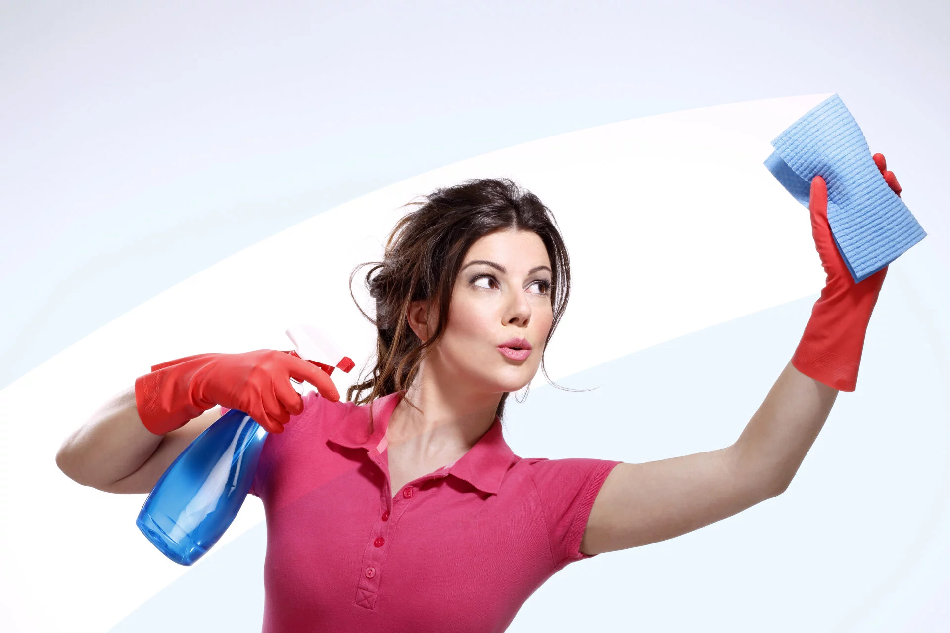 young housewife cleaning with natural cleaners