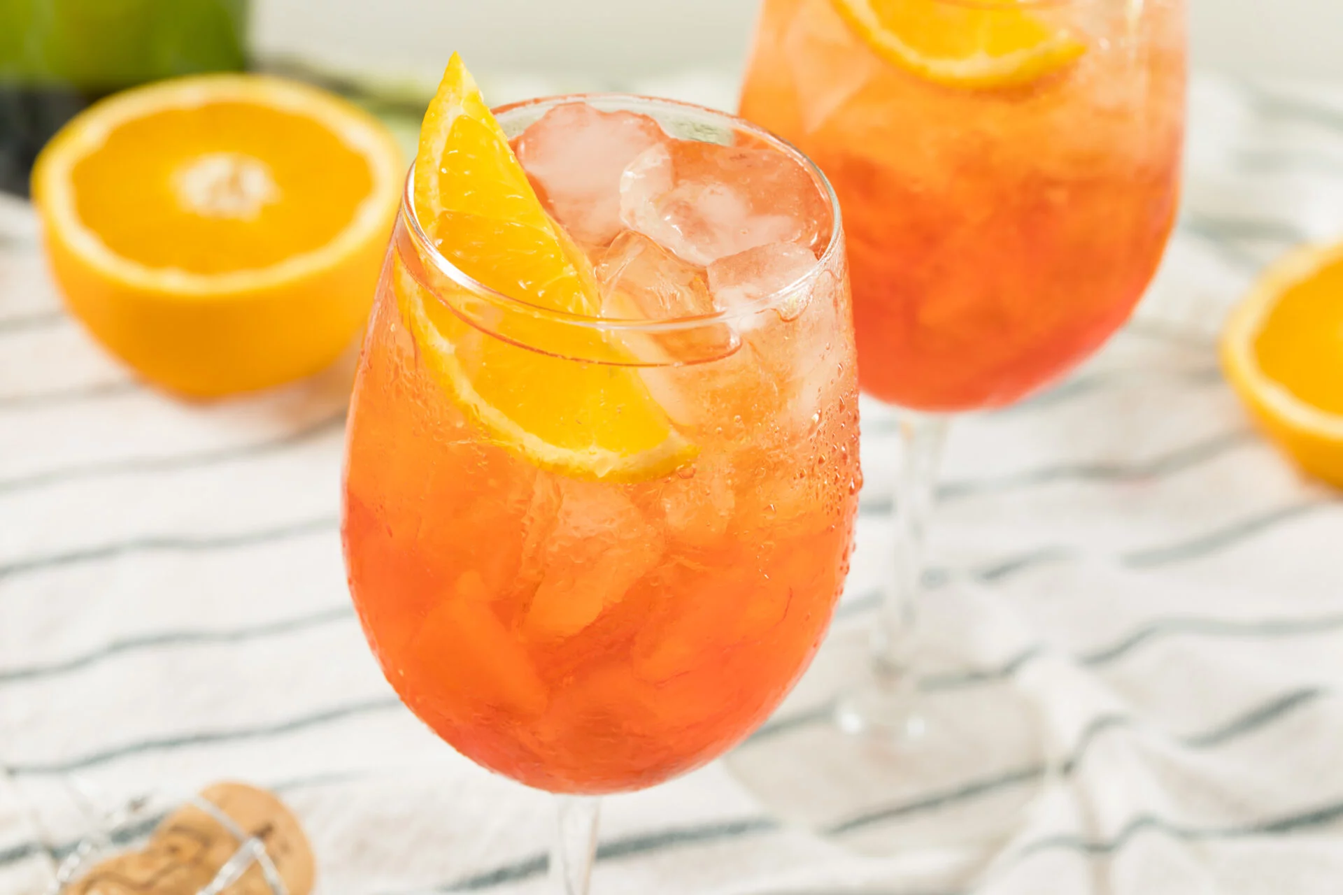 Alcoholic Aperol Spritz with Champagne and Oranges