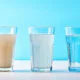 3 different glasses of water with clean and polluted water