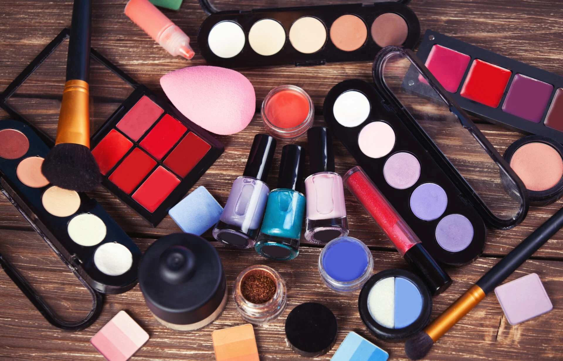 Cosmetics on wooden table