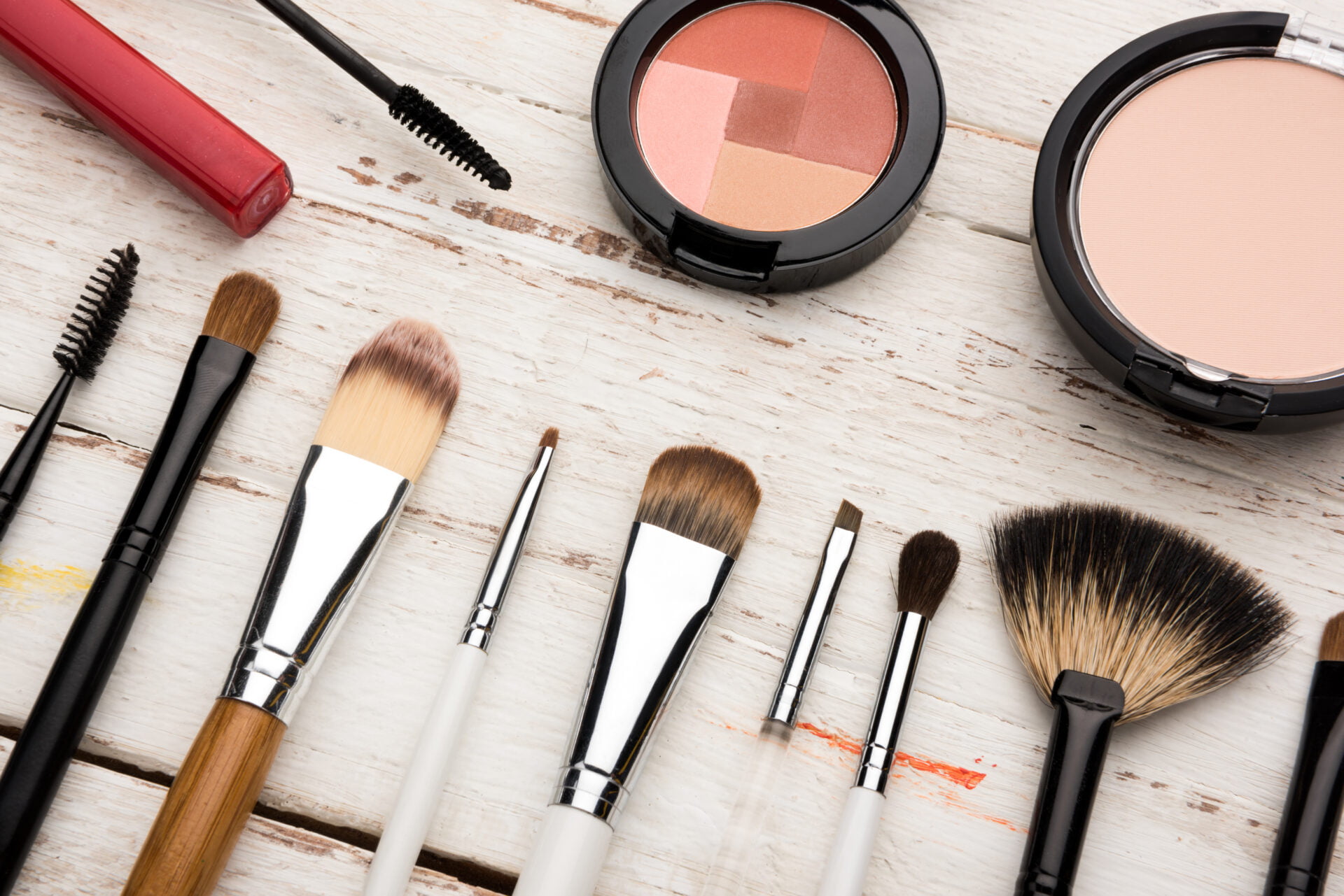 makeup laid out on a white table