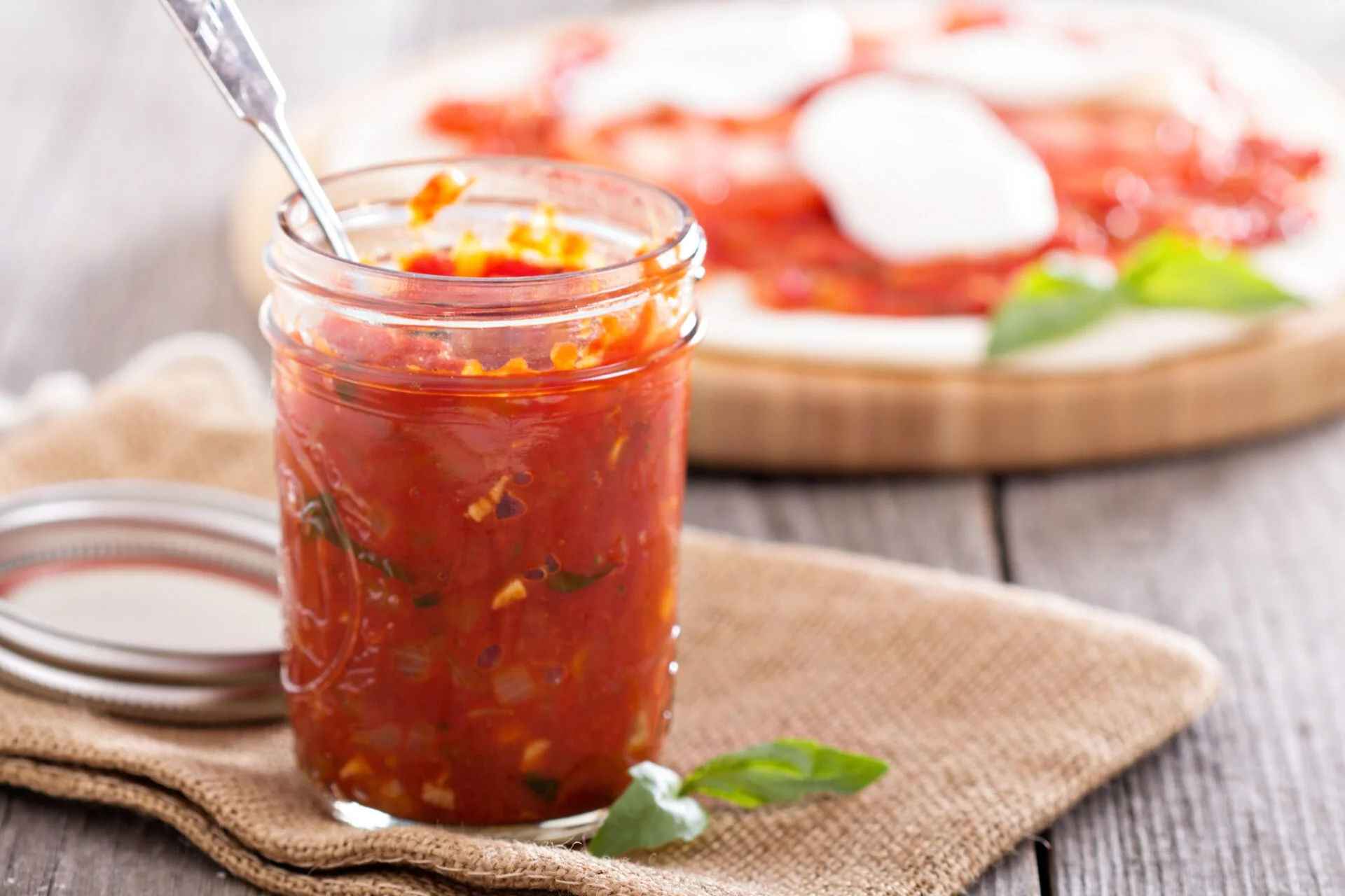 Pizza sauce in a jar - making pizza