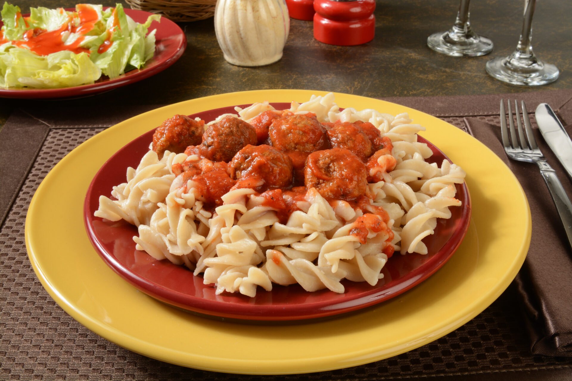 Marinara sauce with Italian meatballs on gluten free Fusilli pasta with parmesan cheese