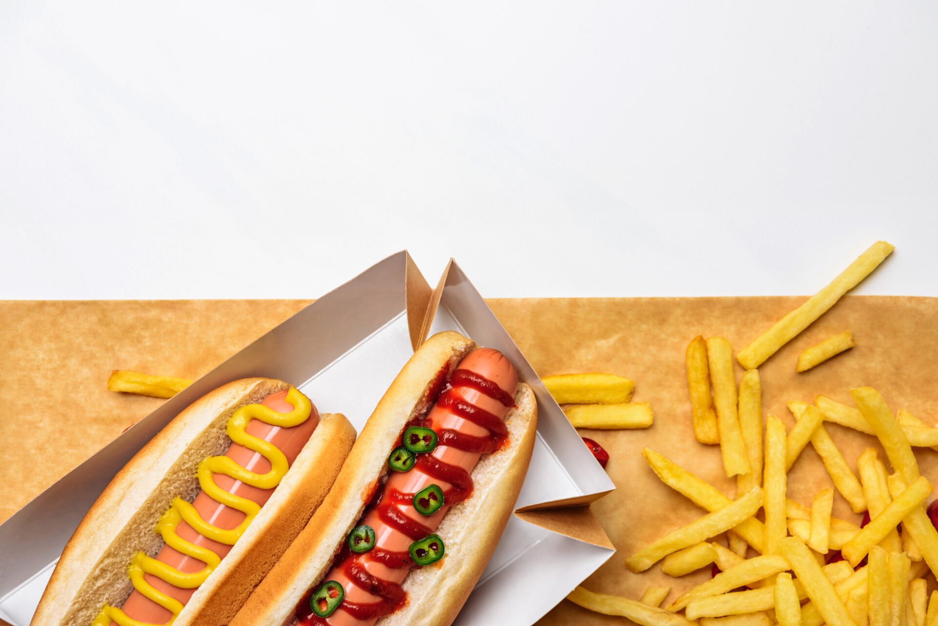 hot dogs with fries on PFAS coated food packaging
