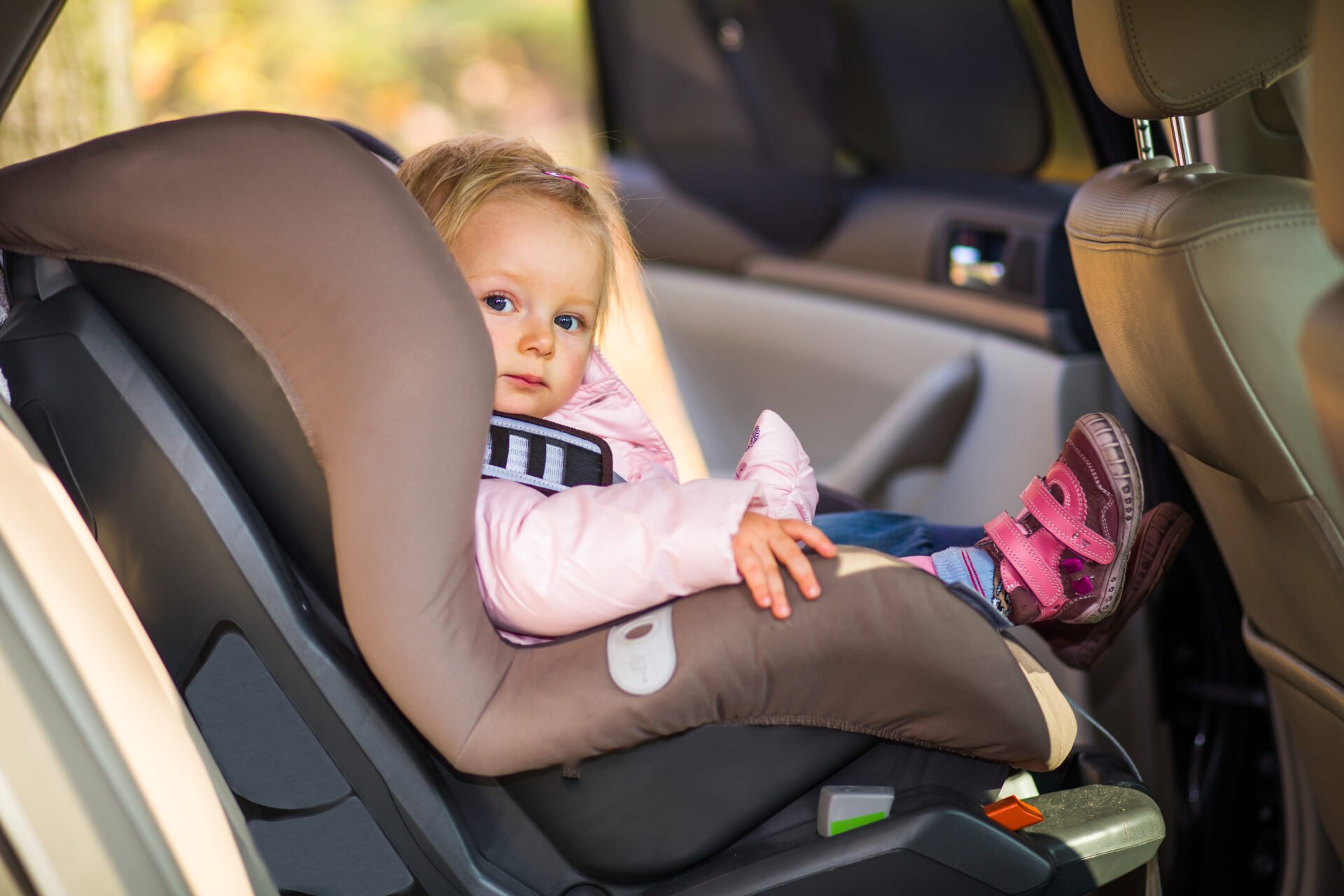 baby girl in safe non-toxic car seat