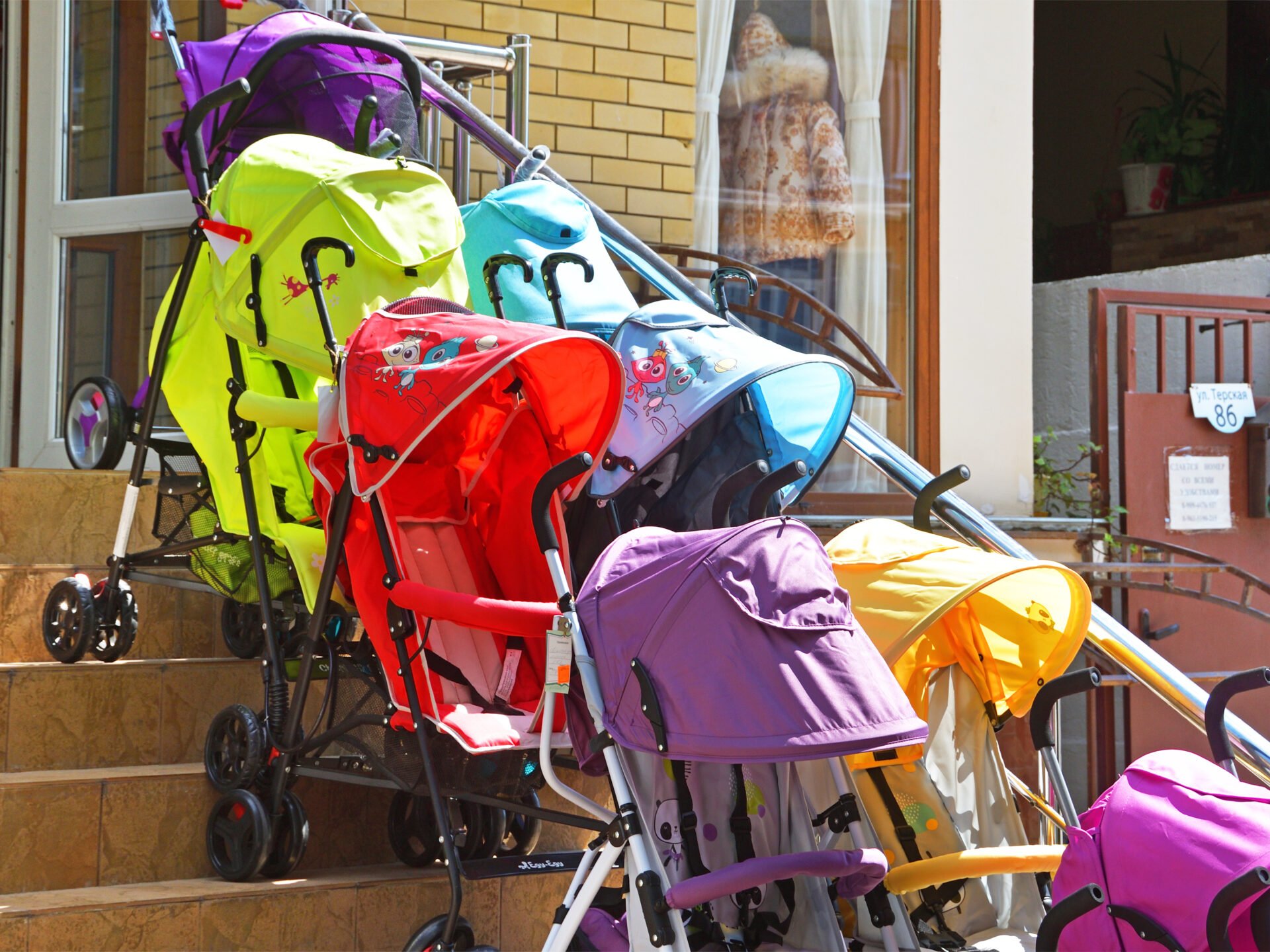 Several colorful non-toxic Umbrella strollers 