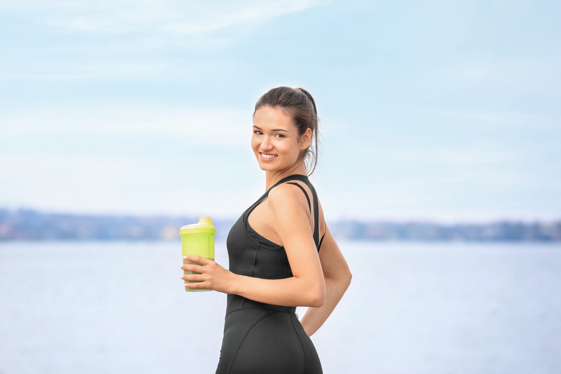 Woman drinking a nutritional beverage that was recalled