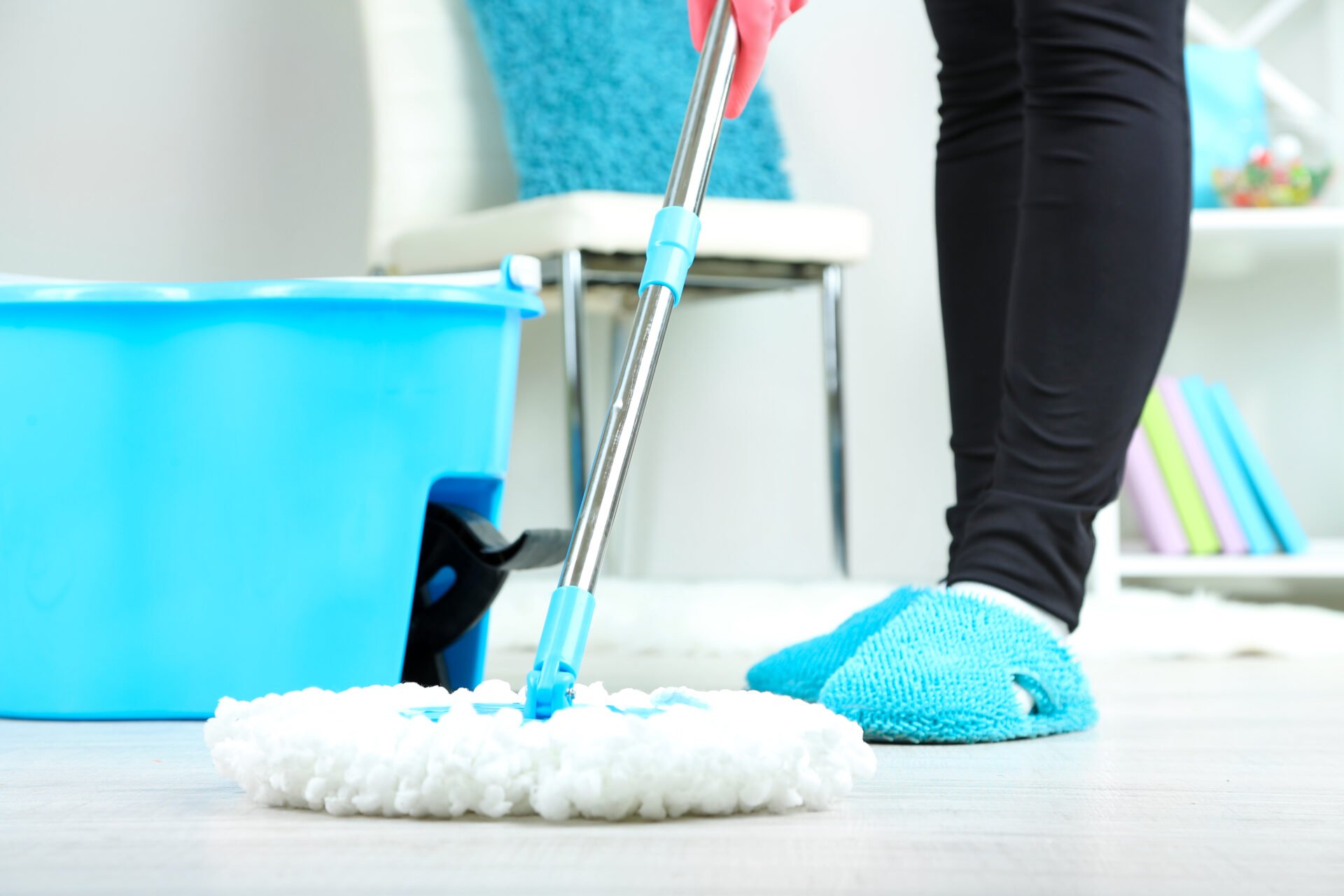 Mopping floor at home close-up
