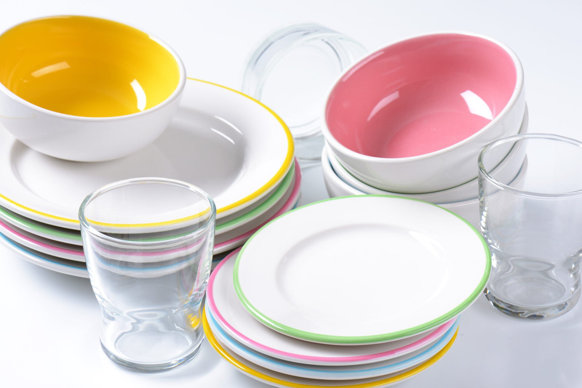 Toxic Dinnerware set consisting of deep bowls, dinner plates, side plates and glasses