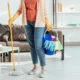 Woman cleaning home with non-toxic products