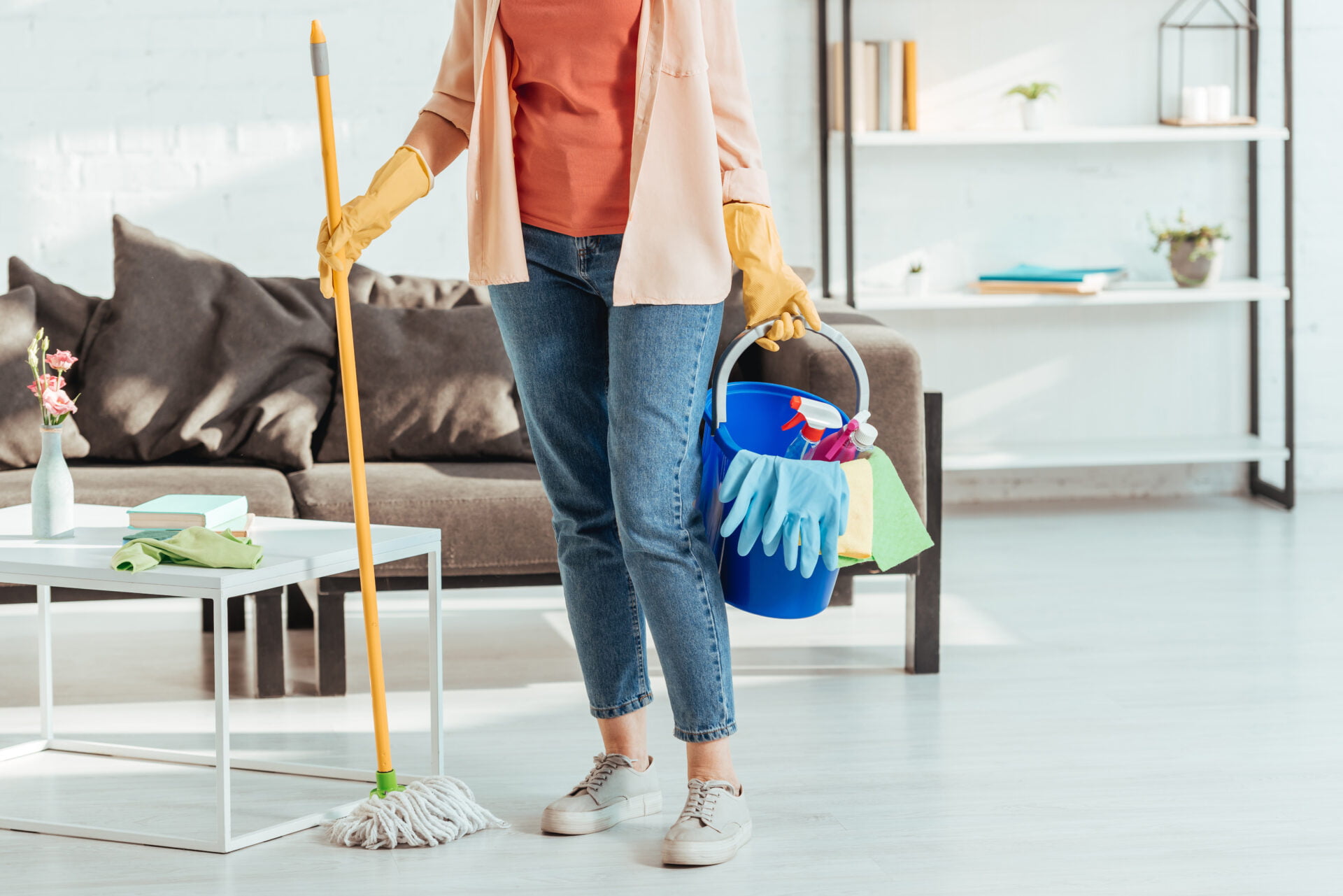 Woman cleaning home with non-toxic products
