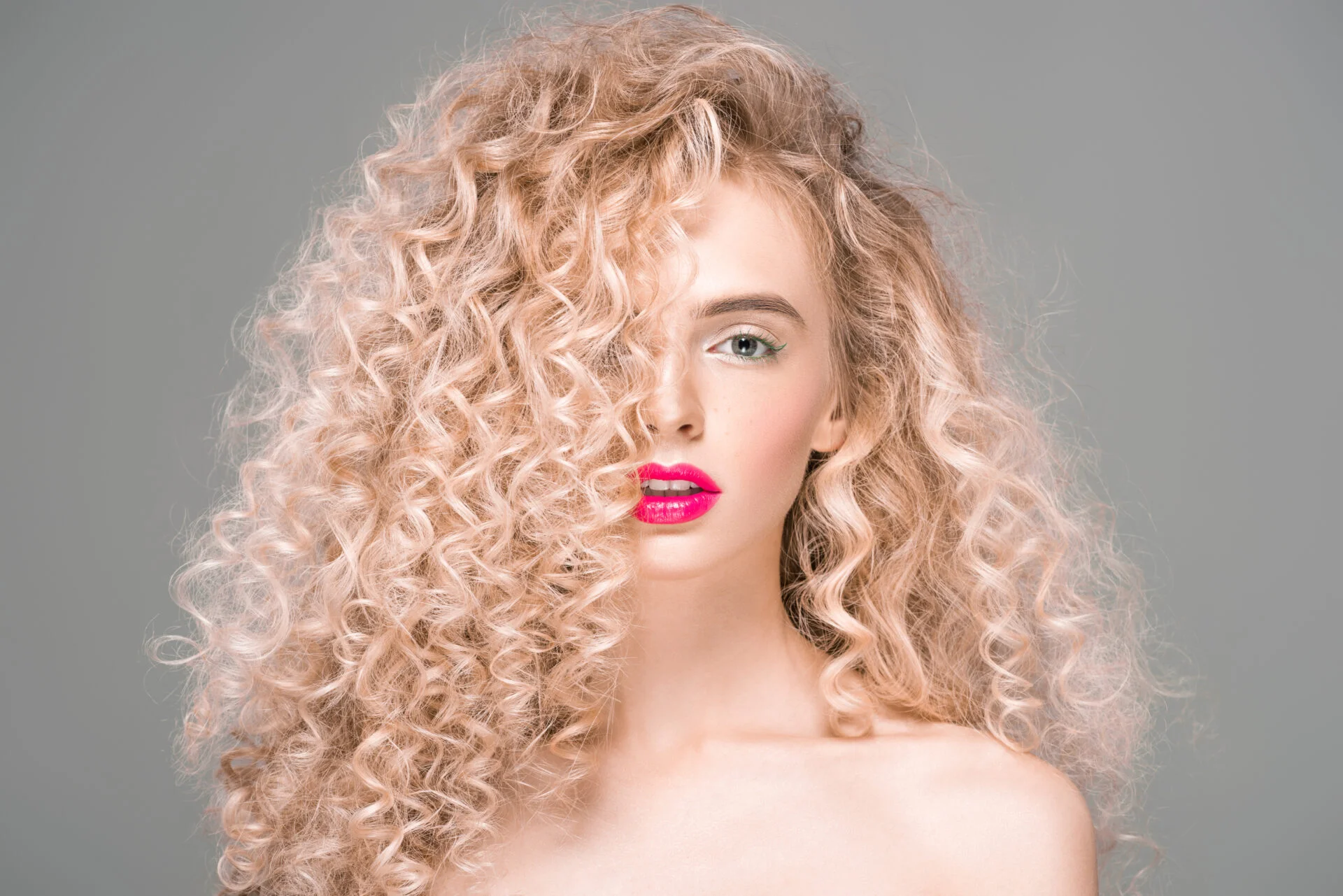 Woman with curly blonde hair