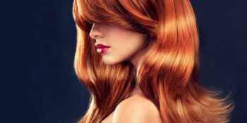 Redhead with non-toxic leave-in conditioner in her hair