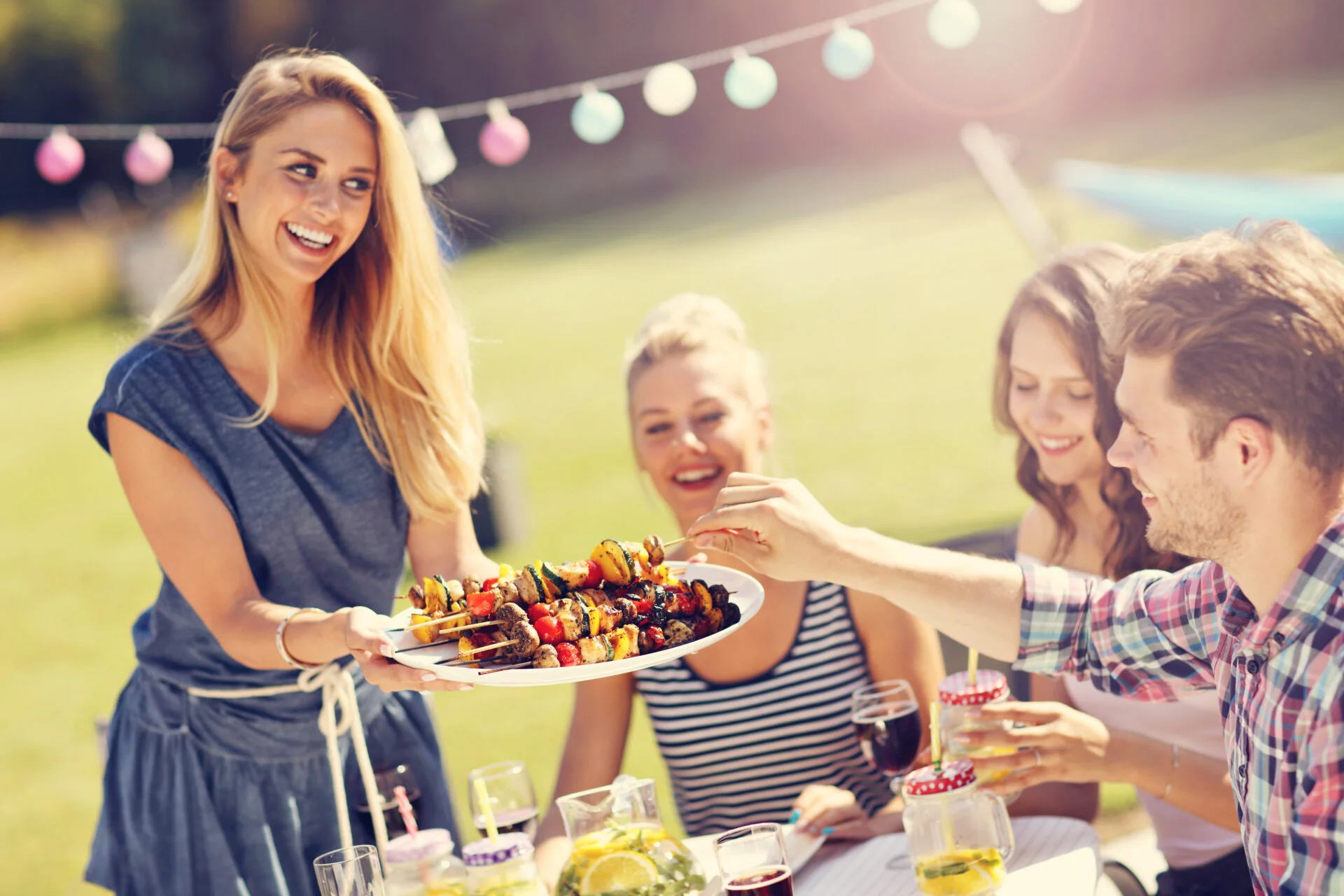 Picture showing group of friends having barbecue party in backyard