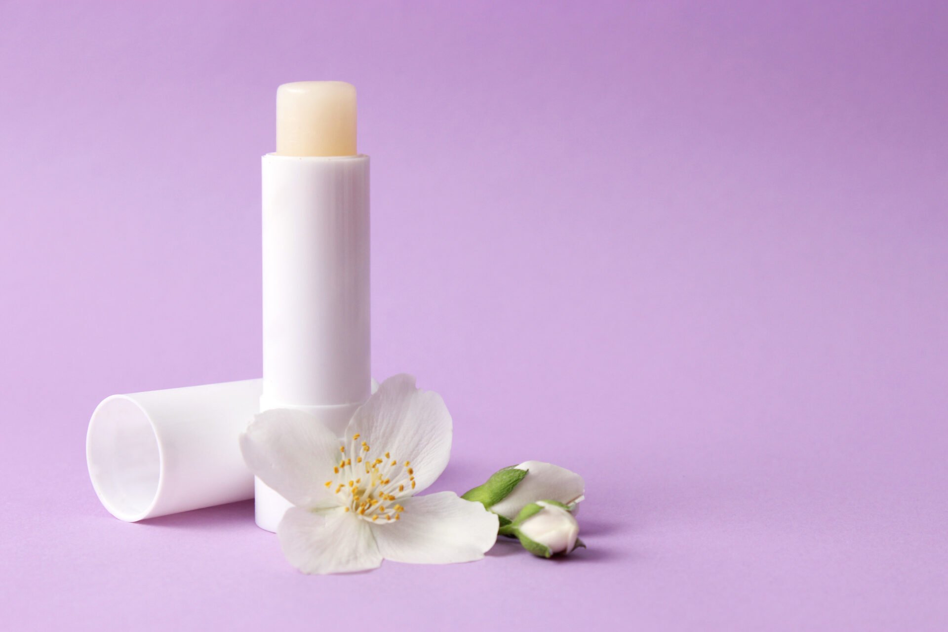 Lip Balm with PFAS "forever chemicals" on a purple background