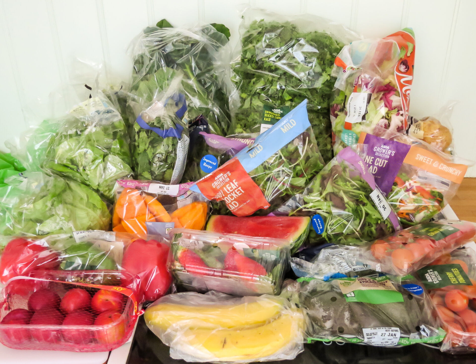 Collection of fresh fruit and vegetables grocery shopping from Asda supermarket.