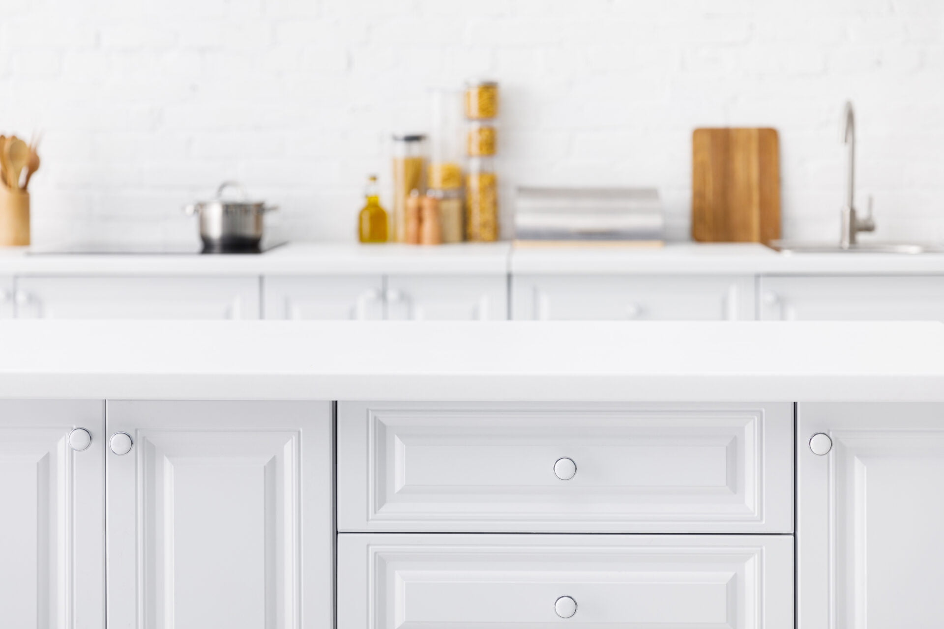 beautiful white kitchen with salt & pepper shakers in the background