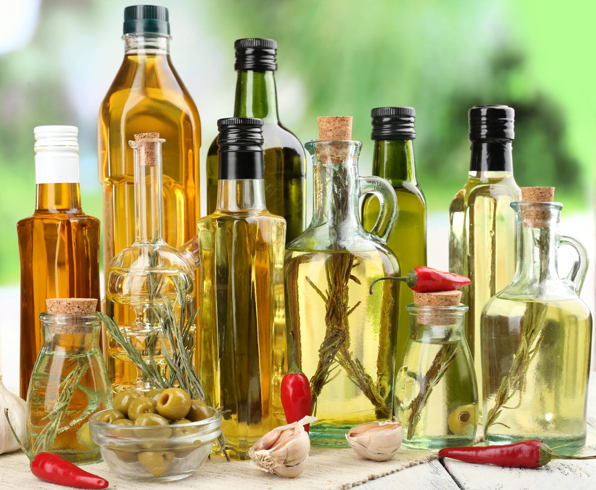 Different types of cooking oils on a table